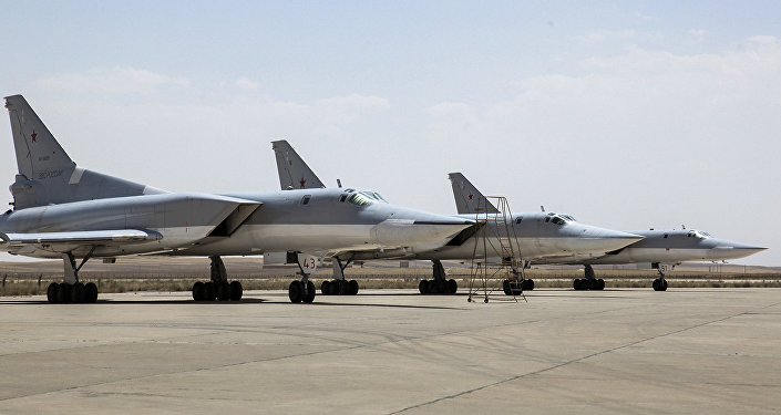 In this photo taken on Monday, Aug. 15, 2016, A Russian Tu-22M3 bomber stands on the tarmac at an air base near Hamedan, Iran.